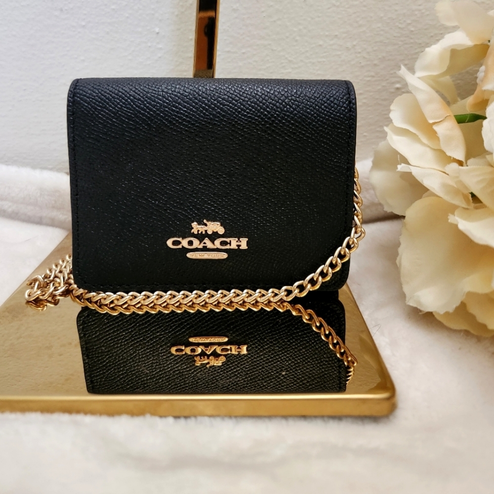 NWOT Coach mini wallet on a chain